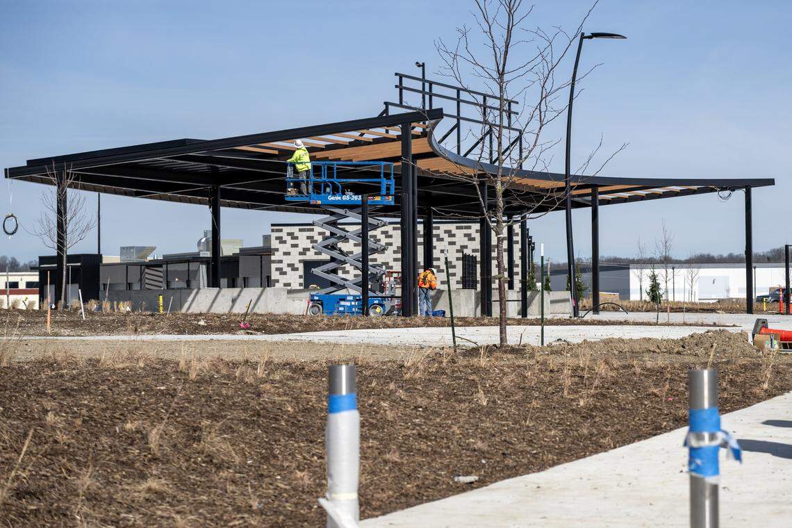 Crew members work near the main entrance of the Morton Amphitheater on Friday, March 13, 2026, in Riverside.