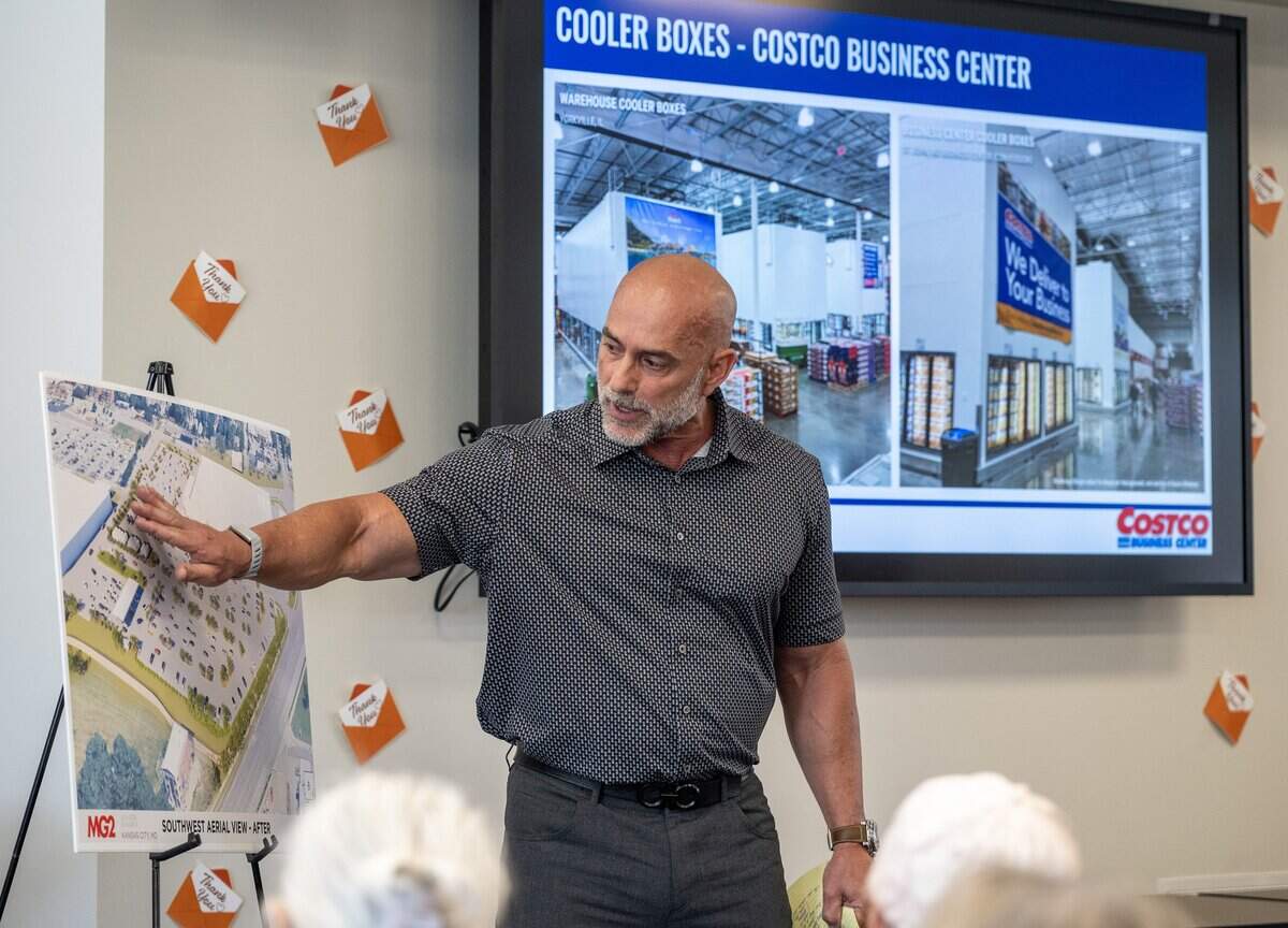 Steven Chamberlain, general manager at Costco Wholesale, speaks during a public meeting about the proposed Costco Linwood Business Center zoning changes at the Westport Library on Tuesday, July 7, 2026, in Kansas City.