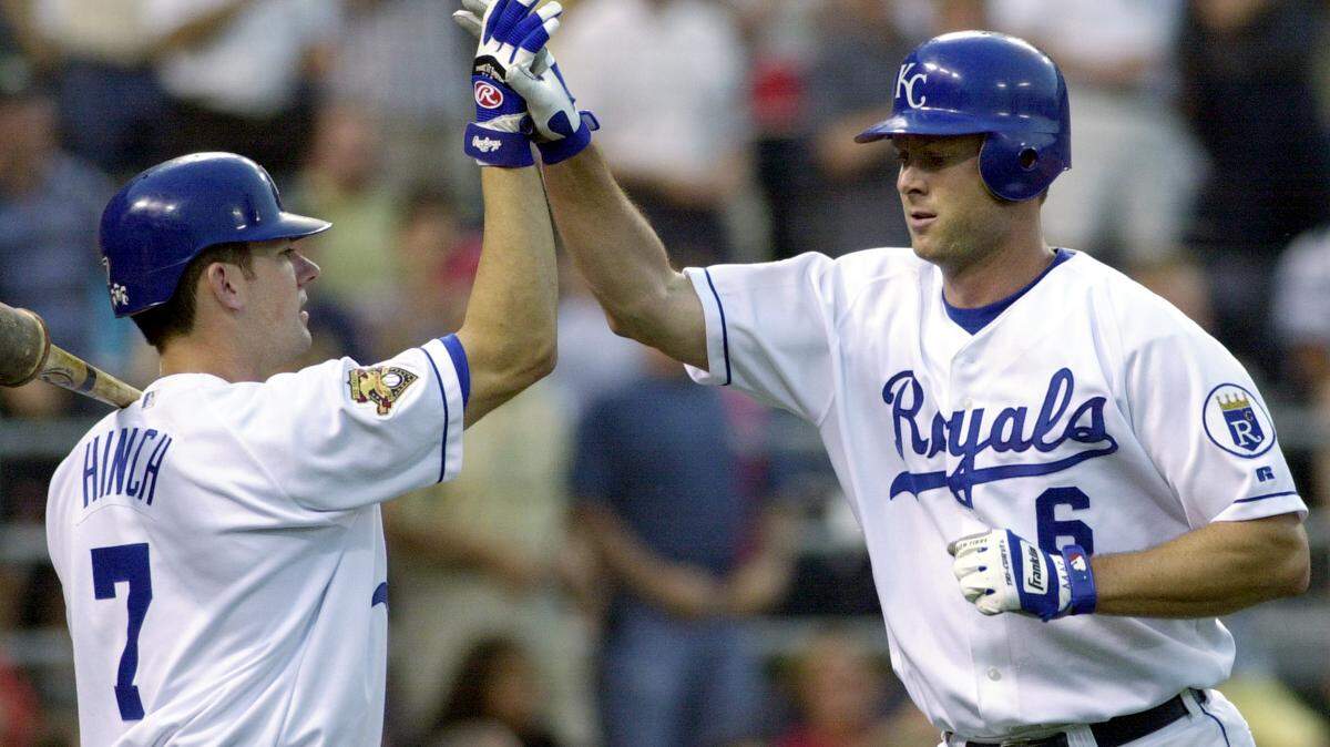 The Royals’ A.J. Hinch (left) congratulated Dave McCarty after McCarty’s home run at Kauffman Stadium in 2001.