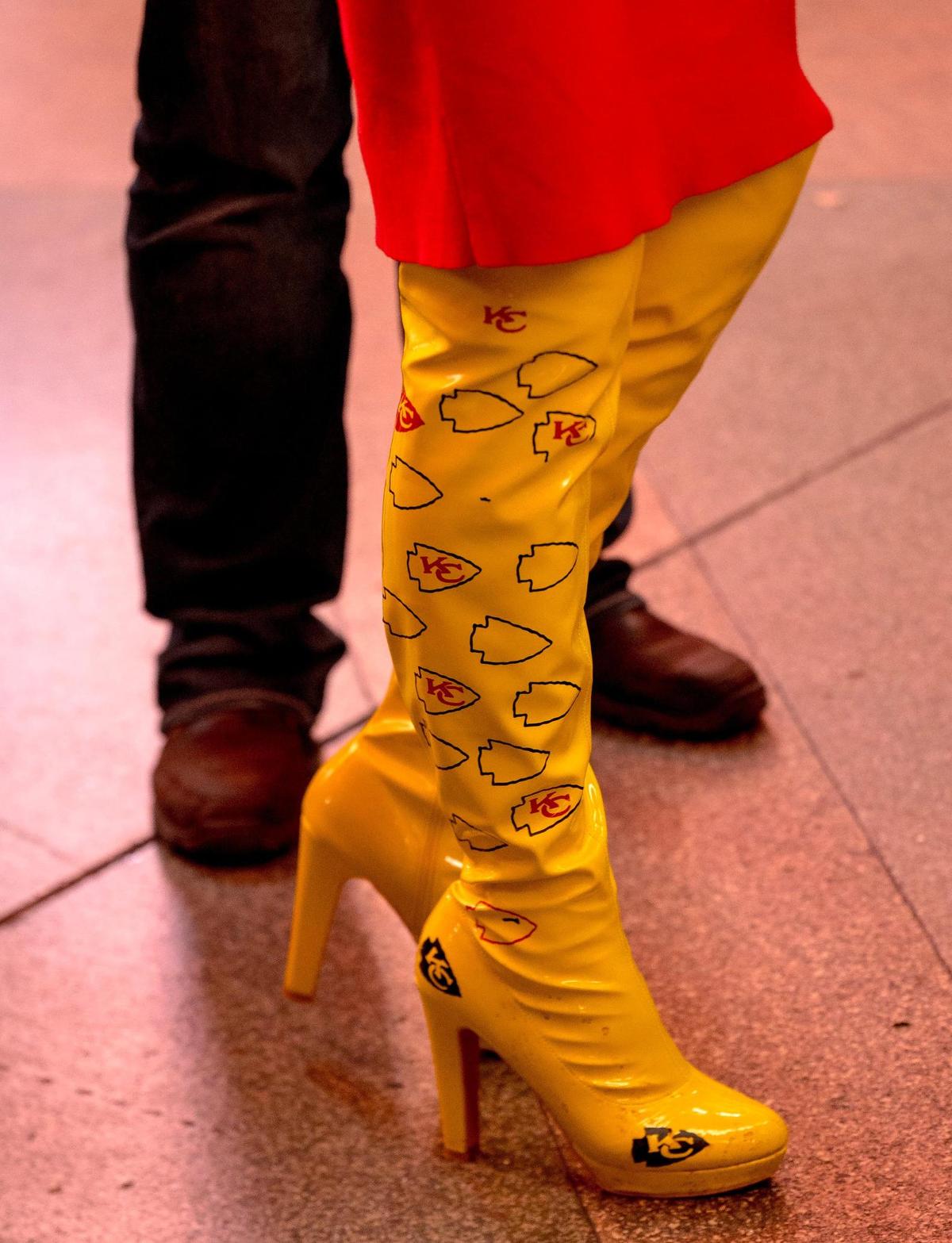 Kansas City Chiefs-styled boots are seen on Fremont Street during a fan gathering on Saturday, Feb. 10, 2024, in Las Vegas.