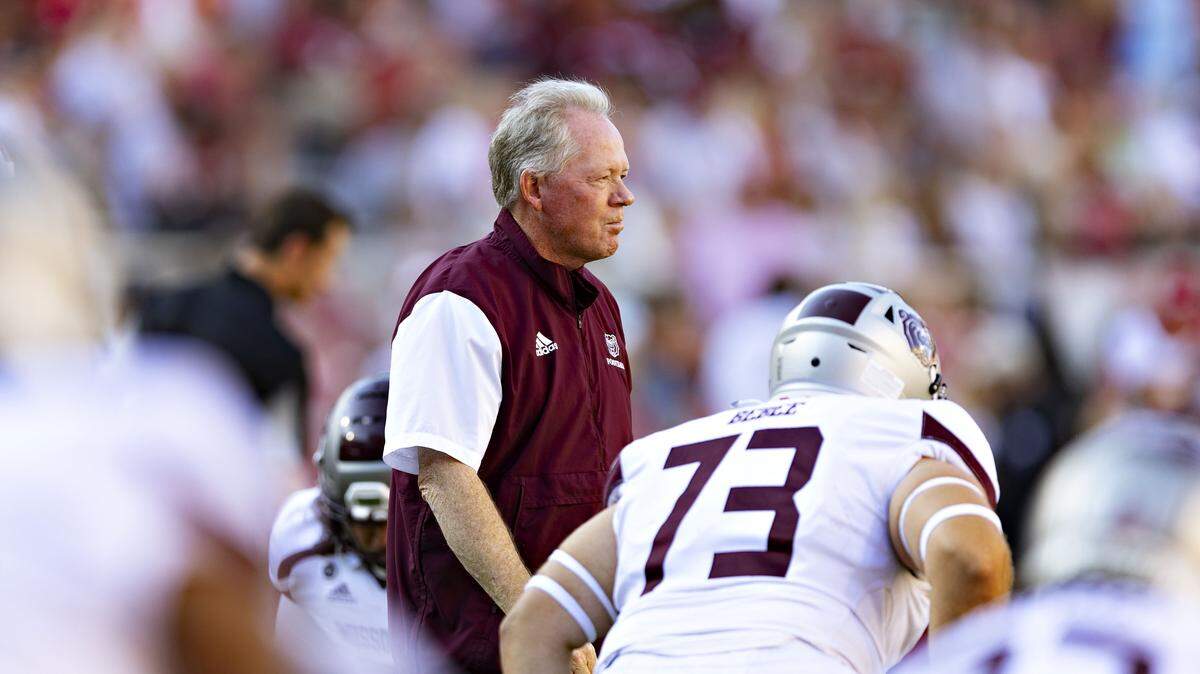 Head coach Bobby Petrino of the Missouri State Bears watches his players warm up before a game against the Arkansas Razorbacks at Donald W. Reynolds Razorback Stadium on September 17, 2022 in Fayetteville, Arkansas.