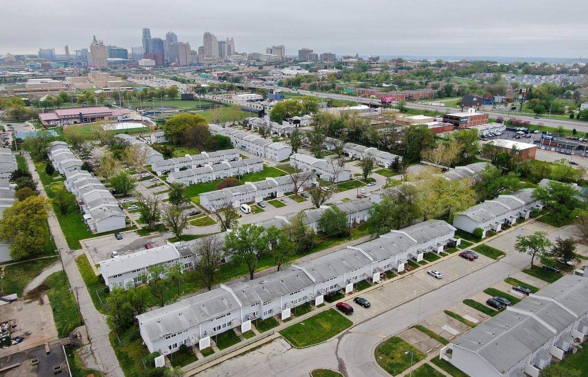 An aerial photograph captures the view of Parade Park Homes, a 510-unit housing cooperative in the 18th & Vine neighborhood. Plans call for the demolition of the housing complex and replacing it with around 20 buildings containing 1,065 units, 470 of which will be designated for affordable housing