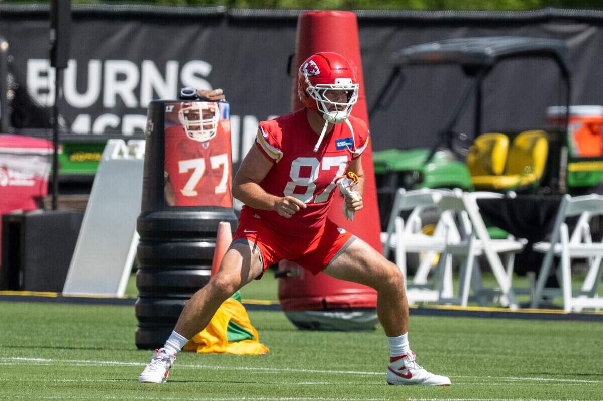 Kansas City Chiefs tight end Travis Kelce stretches during Chiefs Minicamp on Tuesday, June 9, 2026, in Kansas City.