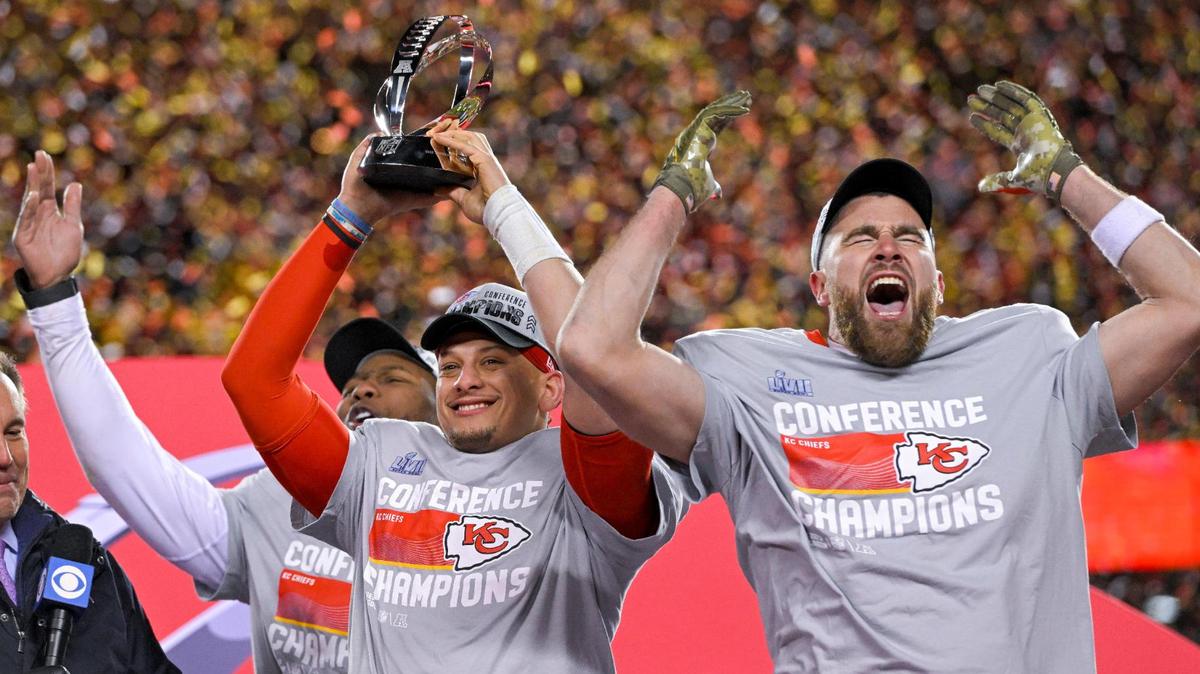 Chiefs defensive end Carlos Dunlap, quarterback Patrick Mahomes and tight end Travis Kelcee and celebrated with the Lamar Hunt trophy after the Chiefs defeated the Cincinnati Bengals, 23-20, in the AFC Championship Game on Sunday, Jan. 29, 2023, at GEHA Field at Arrowhead Stadium.