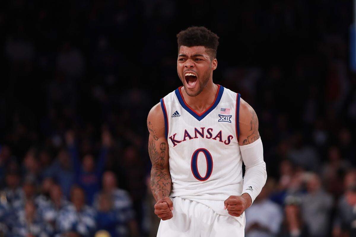 Frank Mason III #0 of the Kansas Jayhawks celebrates after hitting a game-winning shot with 1.8 seconds remaining against the Duke Blue Devils in the second half during the State Farm Champions Classic at Madison Square Garden on November 15, 2016 in New York City.
