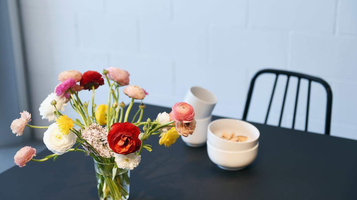 A vase of flowers on a table.