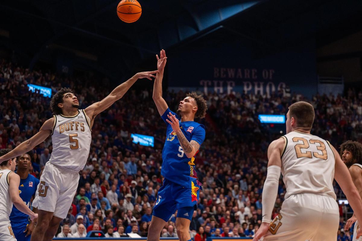 Kansas Jayhawks guard Zeke Mayo shoots a floater over Buffaloes guard RJ Smith in the first half of a game on Tuesday, Feb. 11, 2025, at Allen Fieldhouse.