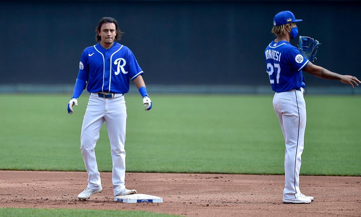 Infielder Nicky Lopez, left, gets to second base during an intrasquad game at the Kansas City Royals spring training 2.0 at Kauffman Stadium Monday, July 7, 2020. Shortstop Adalberto Mondesi waits for the ball.