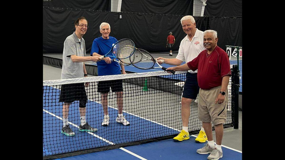 Paul Dew, Jack Malarky, Paul Stevens and George Varghese meet up often for a game of tennis.
