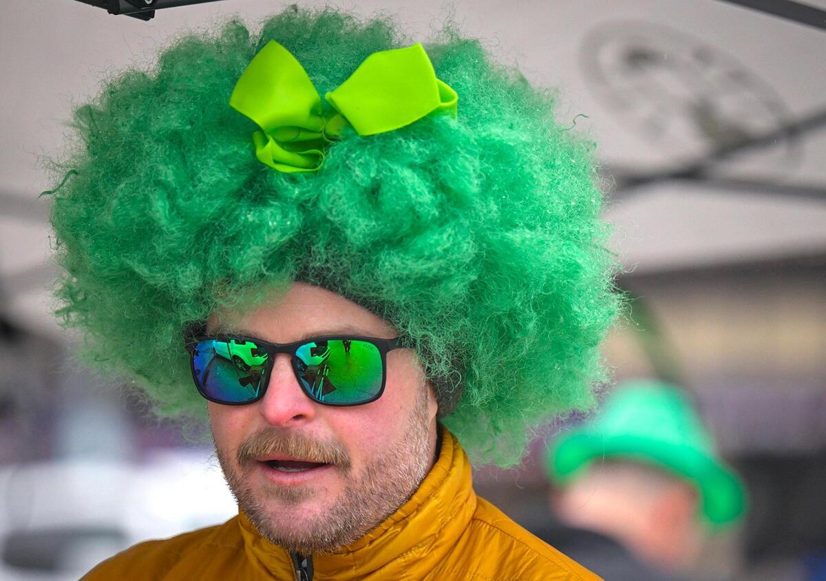 Neal Lawless of Kansas City sported his best Irish hair during the 2023 Brookside St. Patrick’s Day Warm-Up Parade on Saturday March 11, 2023 in Kansas City.