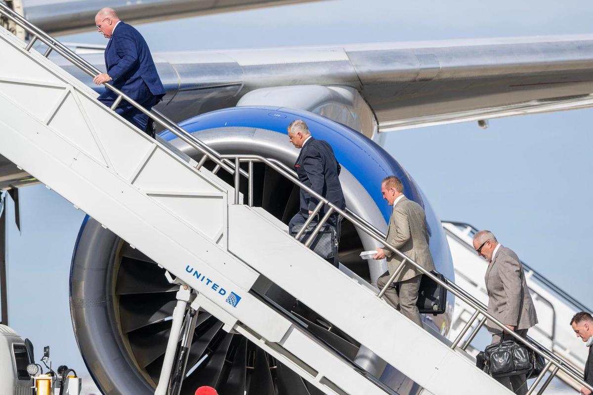 Kansas City Chiefs coaches board a United Airlines flight from Kansas City International Airport on Sunday, Feb. 2, 2025, traveling to New Orleans for Super Bowl LIX.