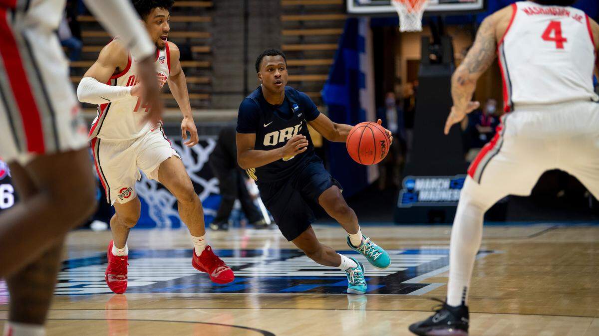Max Abmas of Oral Roberts University dribbles past Justice Sueing of Ohio State in the first round of the 2021 NCAA Division I Men’s Basketball Tournament held at Mackey Arena on March 19, 2021 in West Lafayette, Indiana. (Photo by Andy Hancock/NCAA Photos/NCAA Photos via Getty Images)