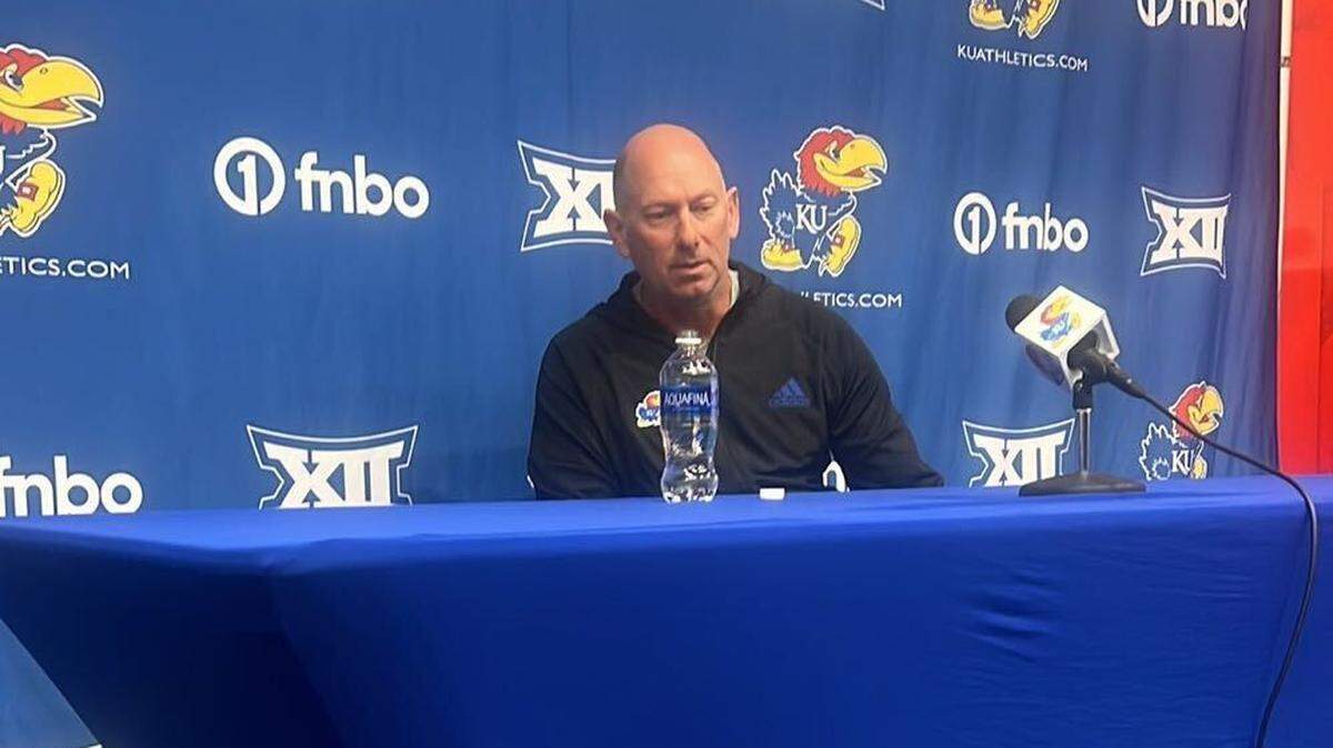 New Kansas assistant Sean Snyder, who took a job with the Jayhawks despite his father being one of the most legendary figures in rival Kansas State sports history.