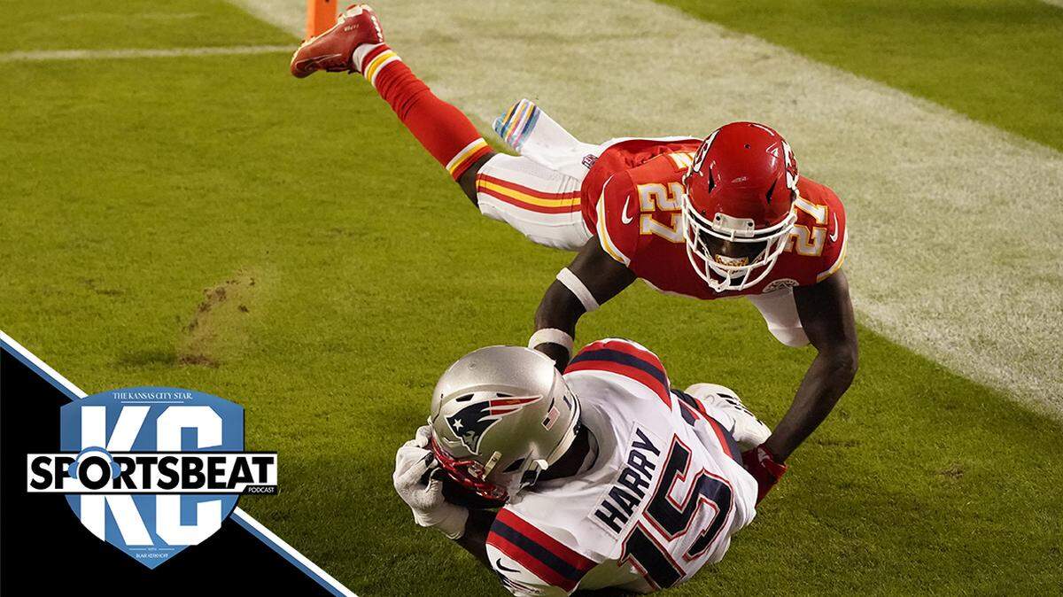 The Patriots’ N’Keal Harry catches a touchdown pass ahead of the Chiefs’ Rashad Fenton on Monday.