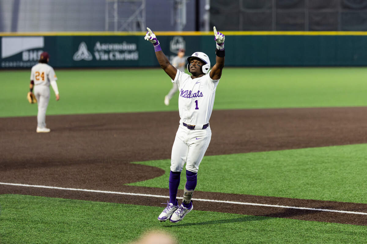 Kansas State baseball’s Dondreone “Dee” Kennedy celebrates as he rounds third base during a 2026 Big 12 game against the Arizona State Sun Devils.