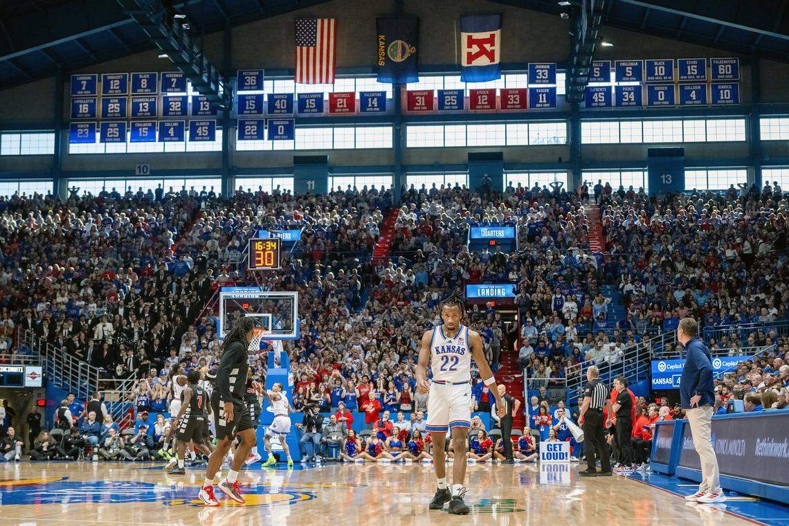 Kansas Jayhawks guard Darryn Peterson (22) walks toward the bench in the game against the Cincinnati Bearcats in the second half Allen Fieldhouse on Saturday, Feb. 21, 2026, in Lawrence, Kansas.  
