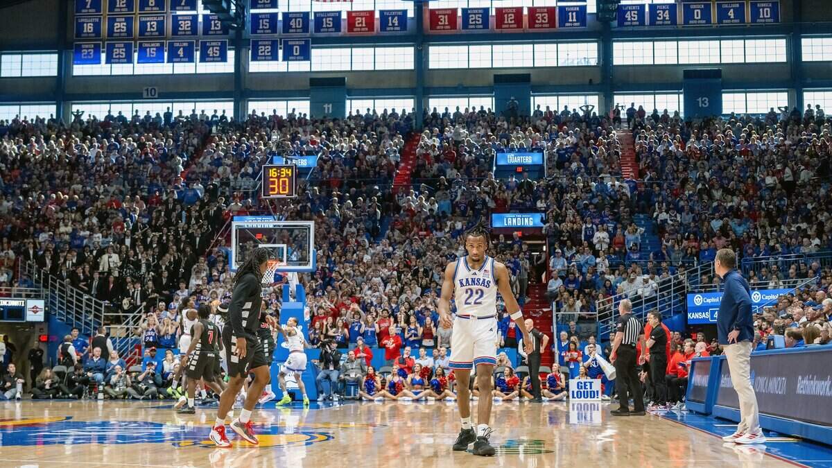 Kansas Jayhawks guard Darryn Peterson (22) walks toward the bench in the game against the Cincinnati Bearcats in the second half Allen Fieldhouse on Saturday, Feb. 21, 2026, in Lawrence, Kansas.  