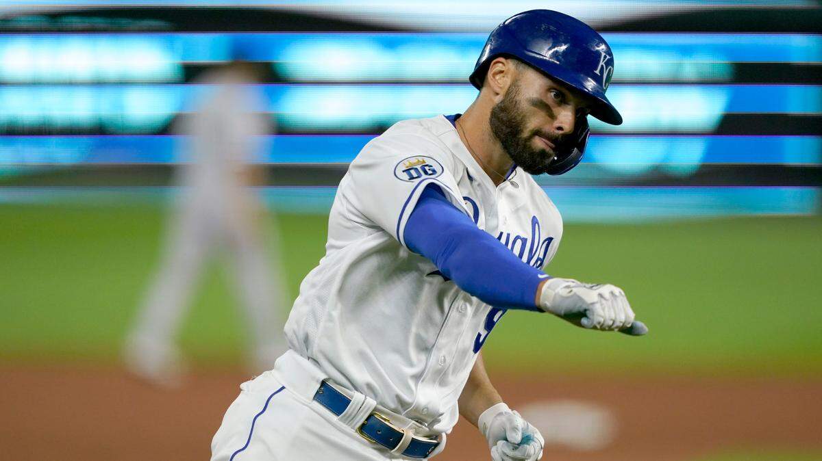 Kansas City Royals’ Ryan McBroom celebrates as he rounds the bases after hitting a solo home run during the sixth inning of a baseball game against the Chicago White Sox Friday, July 31, 2020, in Kansas City, Mo. (AP Photo/Charlie Riedel)