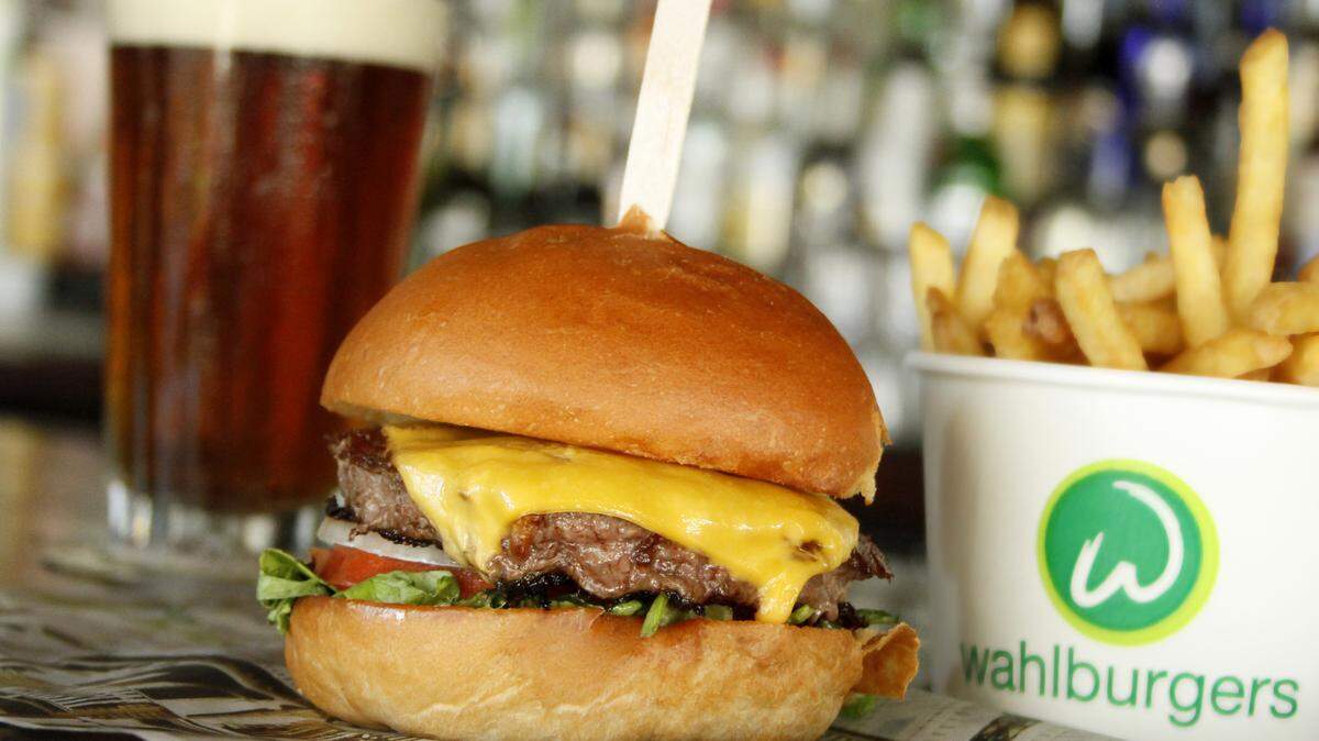 Wahlburgers offers signature burgers, sandwiches, entree salads and frappes and floats in a casual environment.