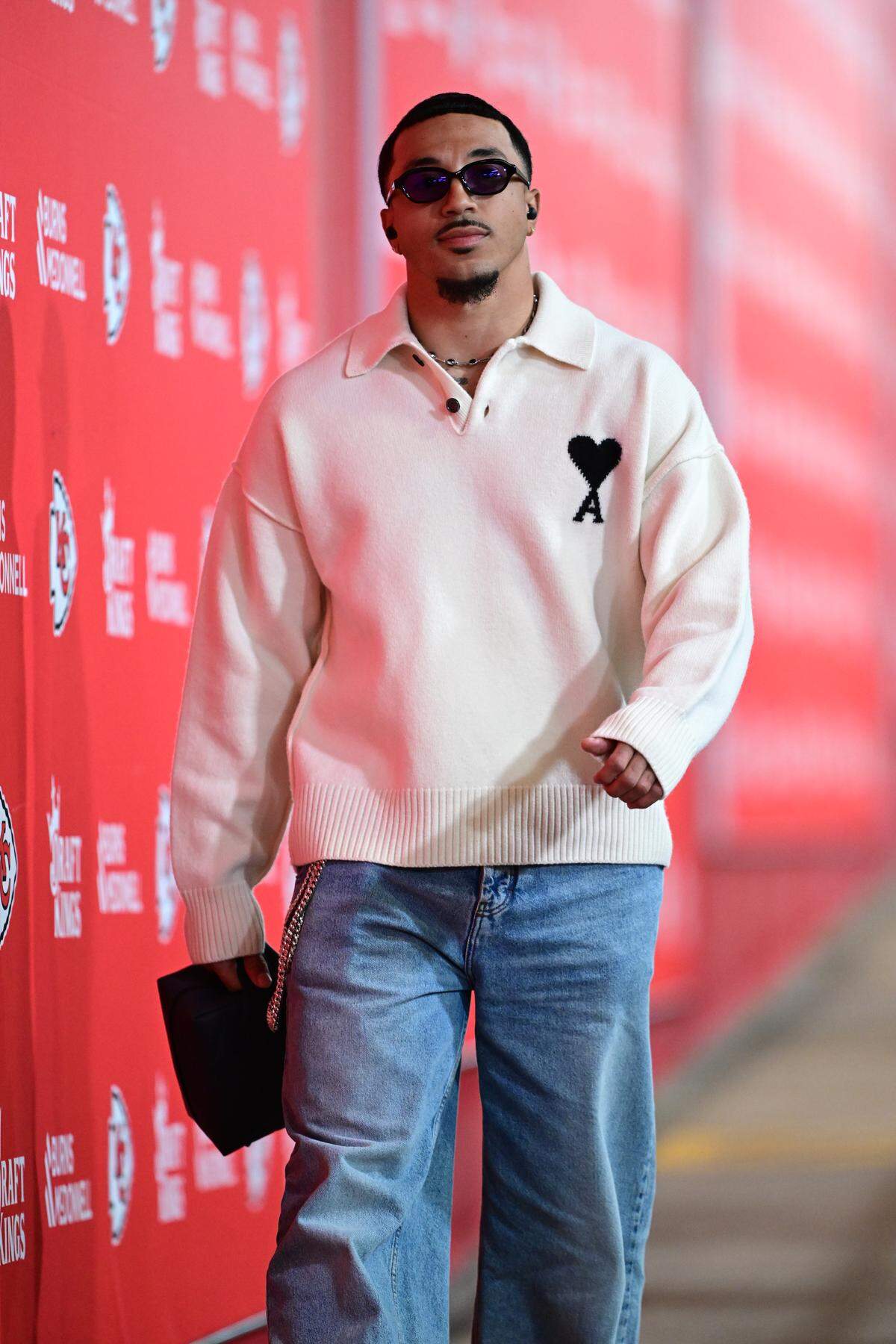Nikko Remigio bundled up in an oversized wool sweater.