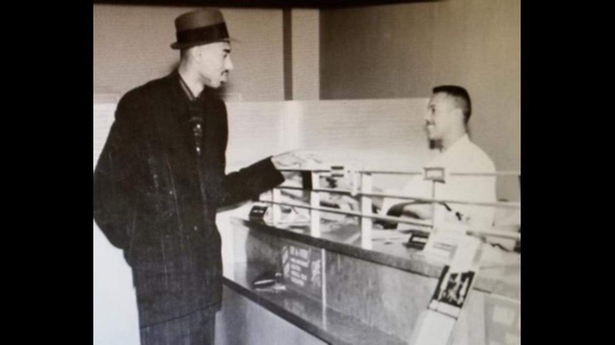 Basketball great Wilt Chamberlain thanks LaVannes Squires for blazing a trail before Chamberlain left KU to become a Harlem Globetrotter.