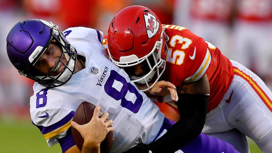 Chiefs line backer Anthony Hitchens crushes Misnnesota quarterback Kirk Cousins for a sack during the first half of Friday night’s preseason game at Arrowhead Stadium.