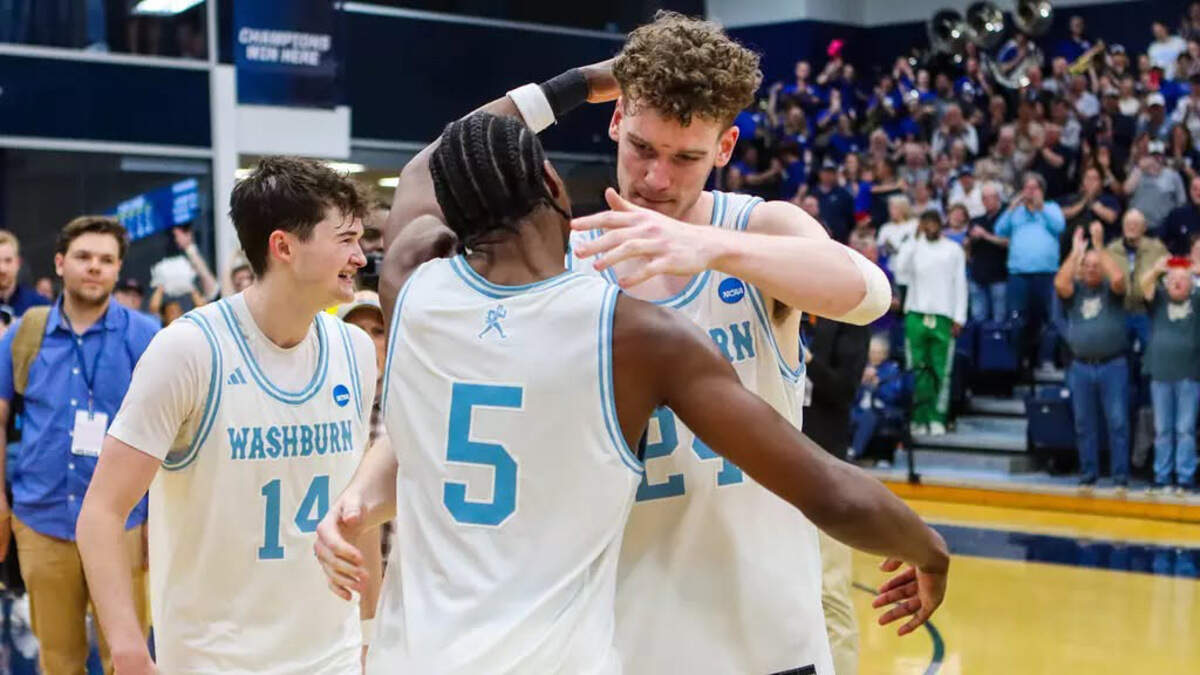 Washburn’s Jacob Hanna (5) and Andrew Orr (24) share a hug after a game against Minnesota State University Moorhead on March 24, 2025.