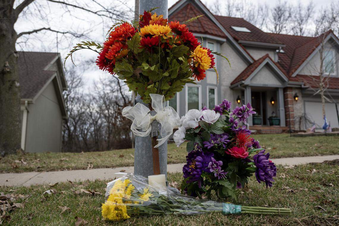 A makeshift memorial for Chris Wells, who was fatally shot Monday, stands by a light post on Tuesday, Jan. 13, 2026, in Kansas City.