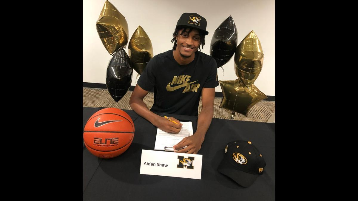 Blue Valley High School forward Aidan Shaw signs his national letter of intent to play for Missouri Tigers men’s basketball.