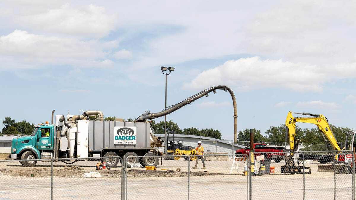 A work crew could be seen Monday afternoon at a parking lot north of Raytown South High School. Students have begun the school year virtually after a natural gas issue was discovered in one of the school’s parking lots.