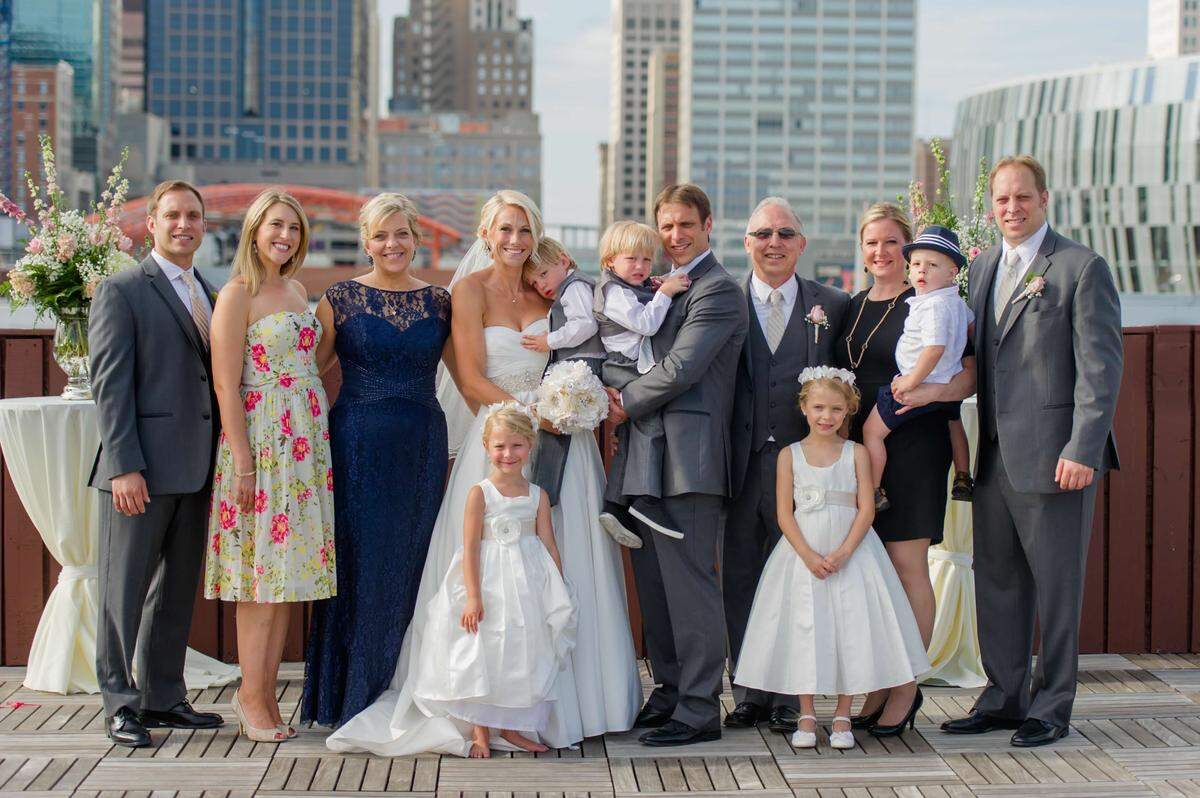 This 2015 photo from the wedding of Brett Veach and his wife, Alison, was taken with the Kansas City skyline as a backdrop.