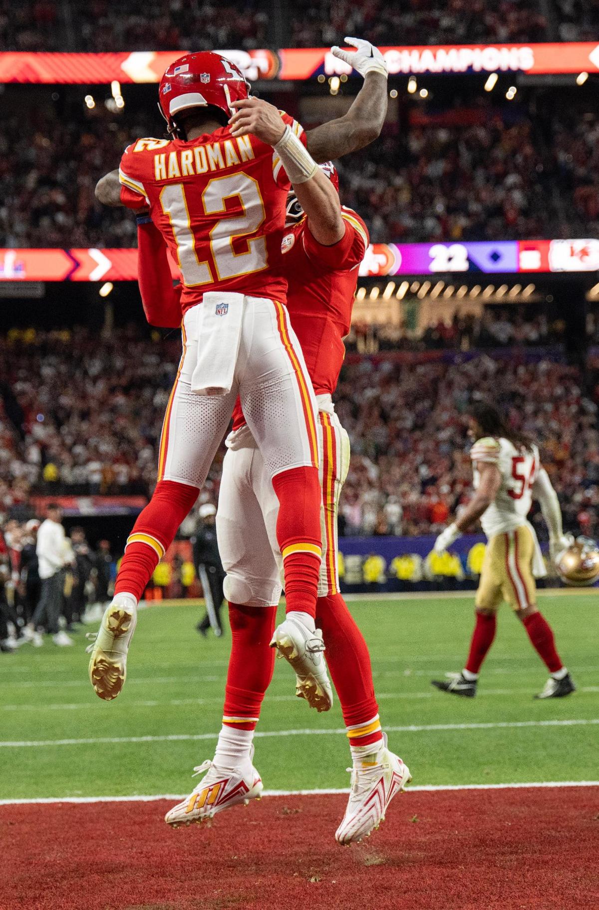 Kansas City Chiefs quarterback Patrick Mahomes (15) lifts wide receiver Mecole Hardman Jr. (12) after he scored the winning touchdown in overtime to beat the San Francisco 49ers, 25-22, in Super Bowl LVIII on Sunday, Feb. 11, 2024, in Las Vegas.
