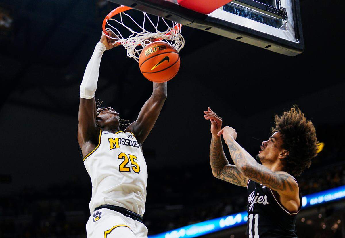 Missouri Tigers guard Mark Mitchell throws down a dunk during an SEC men’s basketball game against the Texas A&M Aggies at Mizzou Arena in Columbia on Saturday, Feb. 8, 2025.