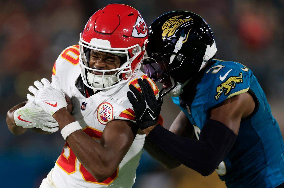 Kansas City Chiefs wide receiver Tyquan Thornton, left, is defended after a catch by Jaguars cornerback Tyson Campbell during an NFL game at EverBank Stadium in Jacksonville, Florida, on Monday, Oct. 6, 2025.