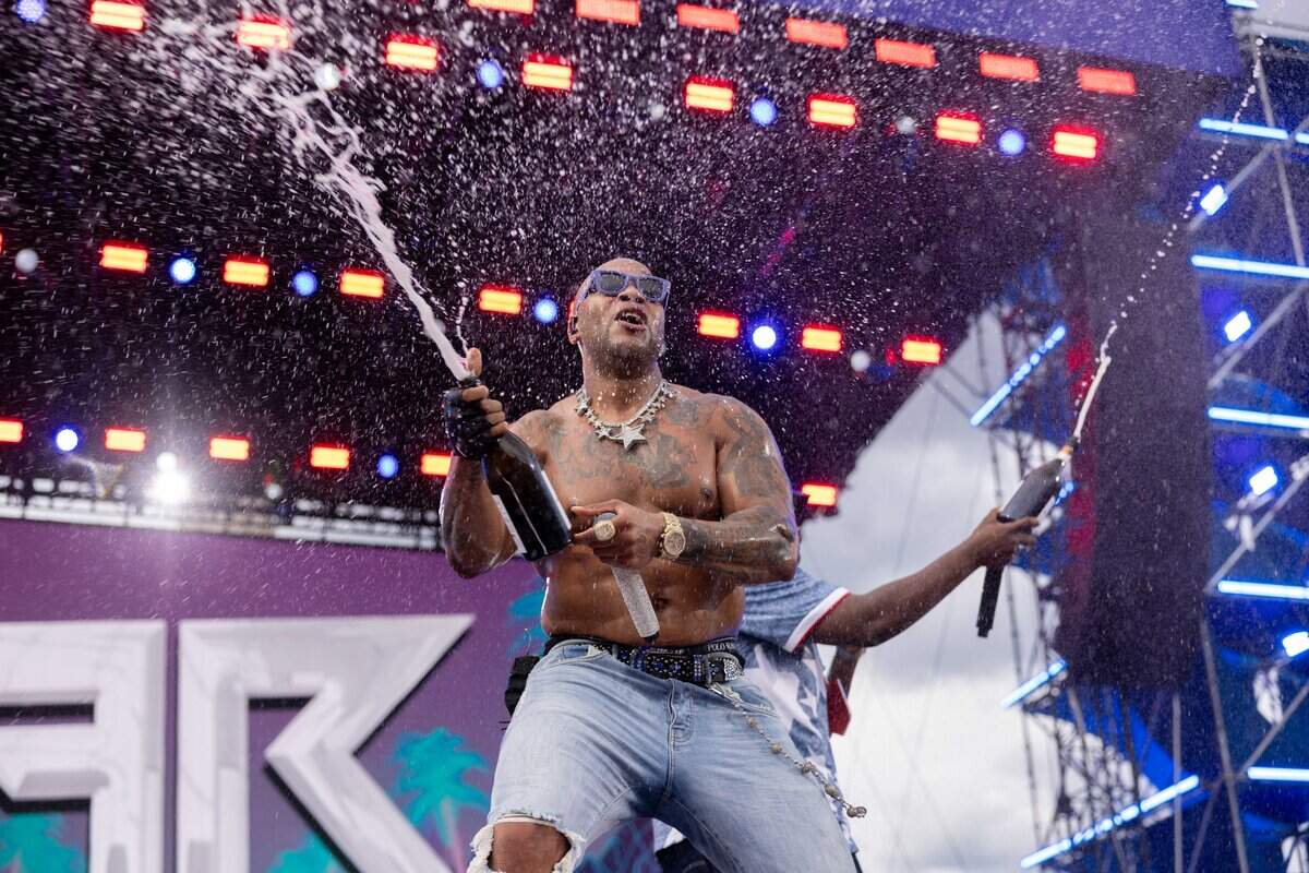 Flo Rida sprays the crowd with champaign during their FIFA Fan Fest concert at Fan Fest on Friday, June 19, 2026.