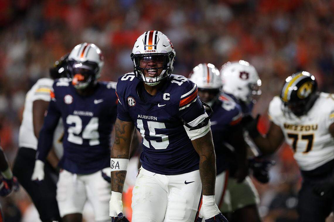AUBURN, ALABAMA - OCTOBER 18: Keldric Faulk #15 of the Auburn Tigers reacts during the first half against the Missouri Tigers at Jordan-Hare Stadium on October 18, 2025 in Auburn, Alabama. (Photo by Justin Ford/Getty Images)