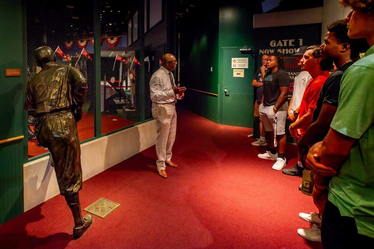Negro Leagues Baseball Museum president Bob Kendrick takes Ban Johnson Collegiate League players a tour on Wednesday, July 19, 2023.