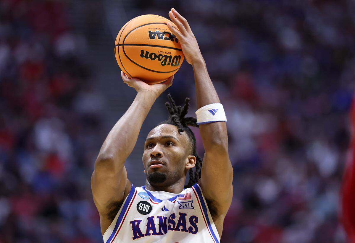 Darryn Peterson #22 of the Kansas Jayhawks shoots a free throw against the St. John's Red Storm during the first half in the second round of the 2026 NCAA Tournament at Viejas Arena on March 22, 2026 in San Diego.