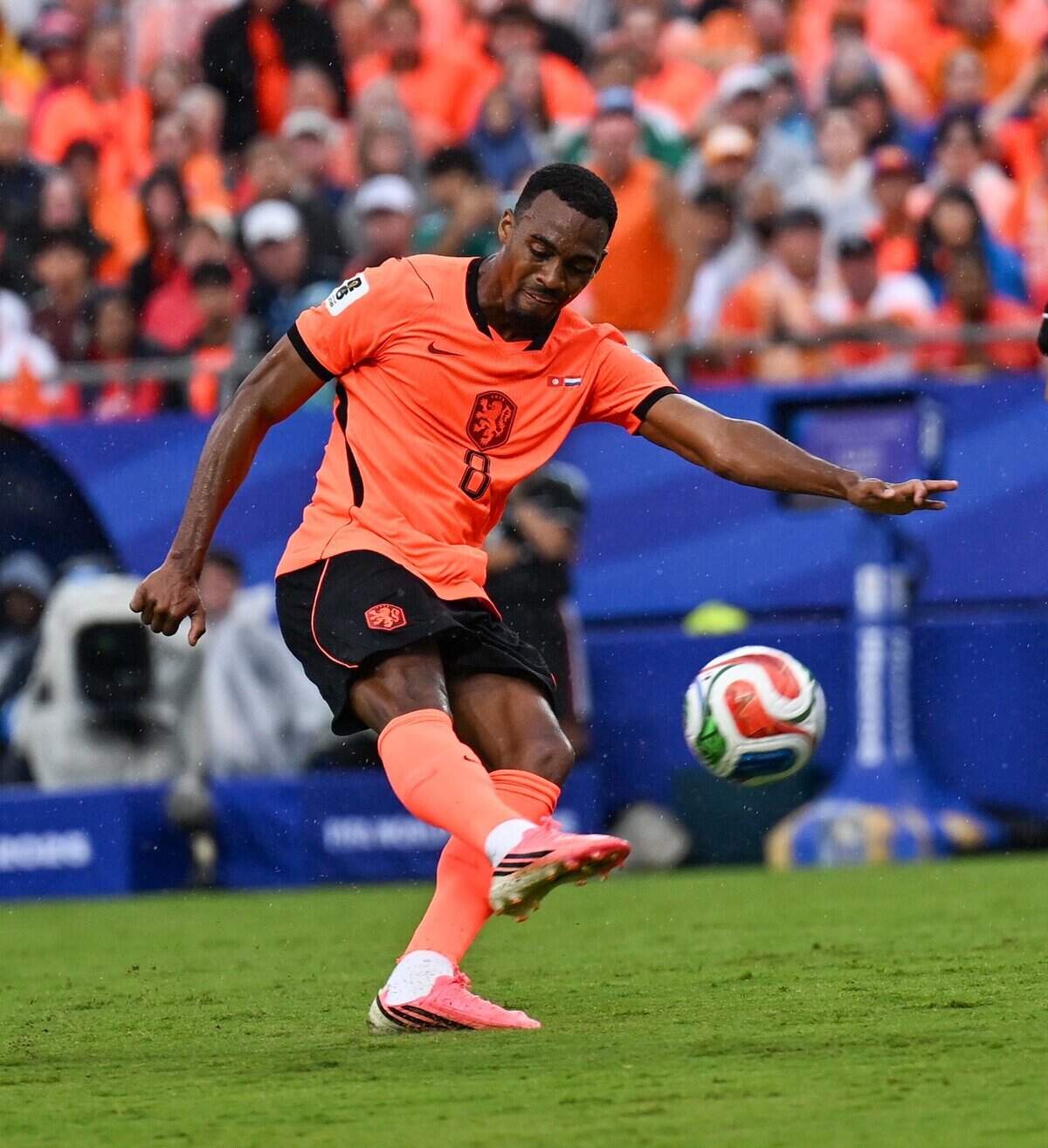 Netherlands midfielder Ryan Gravenberch (8) clears the ball down the pitch in the Netherlands vs. Tunisia FIFA World Cup group-stage soccer match at Kansas City (Arrowhead) Stadium in Kansas City on Thursday, June 25, 2026.