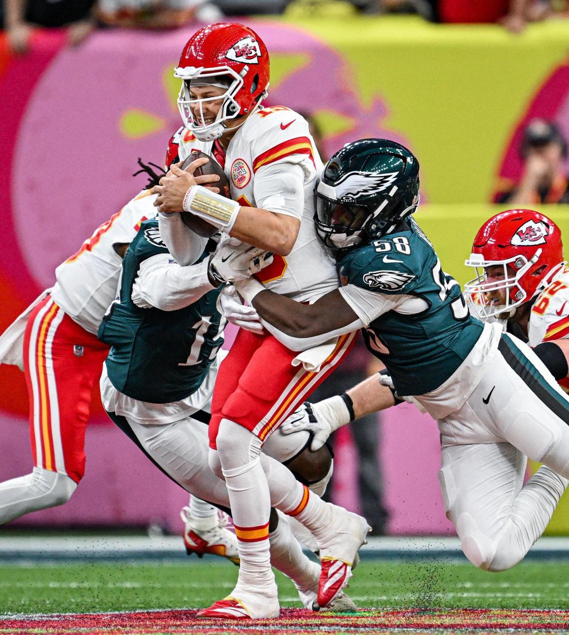 Kansas City Chiefs quarterback Patrick Mahomes (15) is sacked by Philadelphia Eagles linebacker Jalyx Hunt (58) in the quarter during Super Bowl LIX on Sunday, Feb. 9, 2025, in New Orleans.
