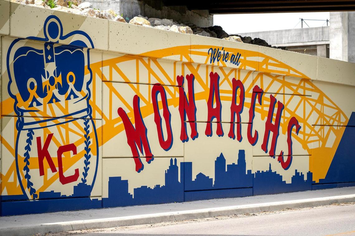 A section of a mural designed by Sike Style Industries under the new Buck O’Neil Bridge is seen near the intersections of Broadway Boulevard and West 3rd Street. The mural pays homage to the bridge’s namesake, Buck O’Neil, and has a portion that shows the old triple arch bridge.