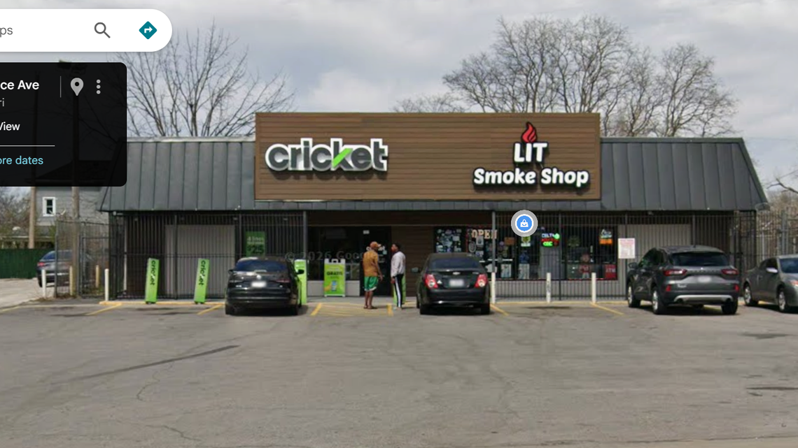 People stand outside of Lit Smoke Shop at the intersection of Independence Avenue and Chestnut Trafficway in this Google Street View screenshot from March. Kansas City sisters were charged in connection to an April shooting at the shop.