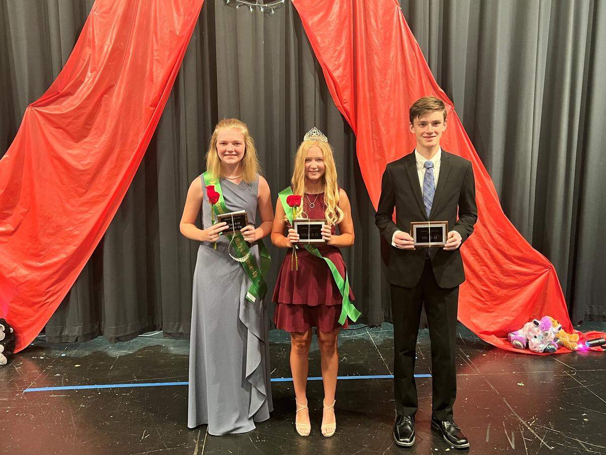 Kylie Rogers (center) and Ryan Brethour (right) were crowned Miss and Mr. 4-H late last month. They are pictured with Fran Schrotberger (left), Miss 4-H Runner Up. As the winners, Rogers and Brethour will represent the Johnson County K-State Research and Extension 4-H Youth Development program at various community events throughout the year, starting with the Johnson County Fair ending on Aug. 6.