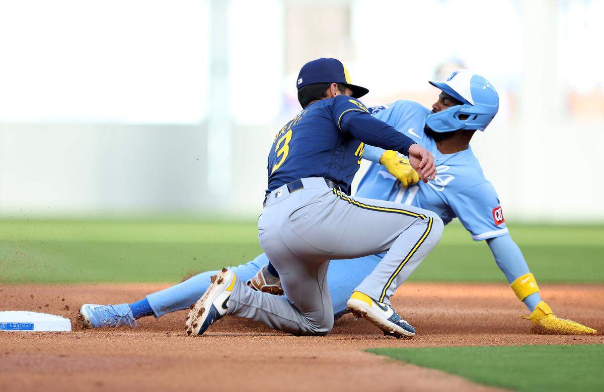 Royals third baseman Maikel Garcia is tagged out by Milwaukee Brewers shortstop Joey Ortiz on a steal attempt in the first inning of a double header nightcap at Kauffman Stadium in Kansas City on Saturday, April 4, 2026.