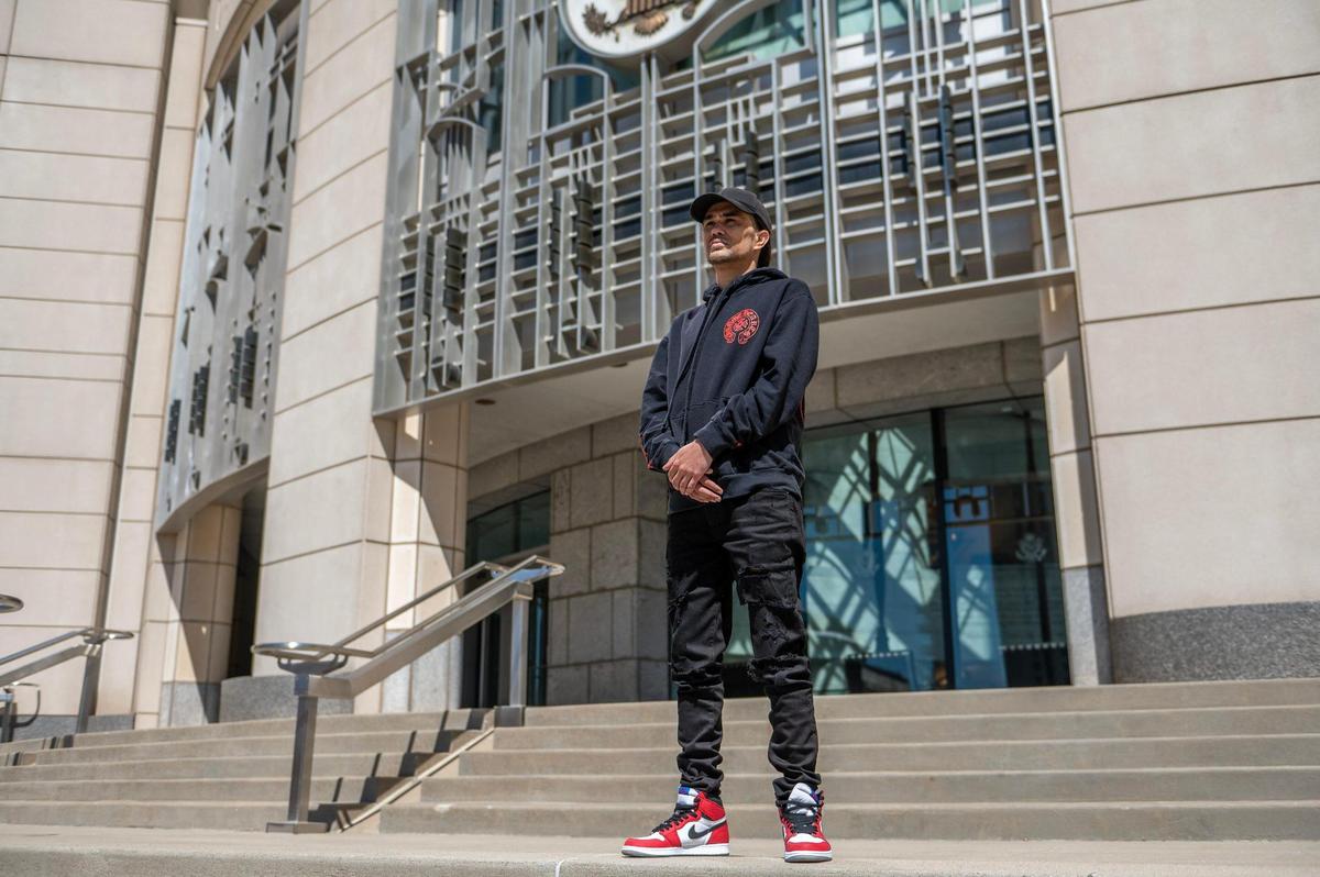 Sean Null is seen standing on the steps of the Charles Evans Whittaker U.S. Courthouse in Kansas City. Null says prosecutors went against Missouri law when using property seized from him as a bargaining chip.