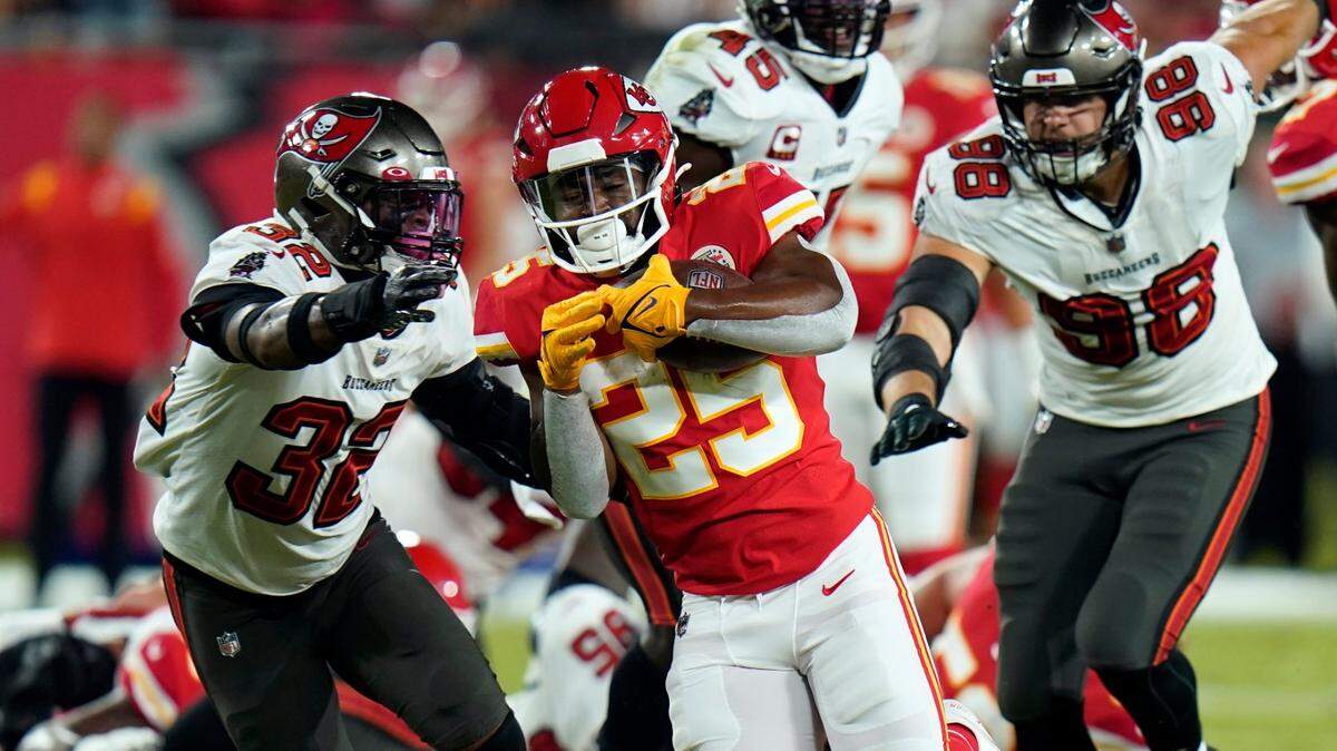 Kansas City Chiefs running back Clyde Edwards-Helaire picks up some tough yardage against the Tampa Bay Buccaneers during Sunday night’s game at Raymond James Stadium in Tampa.