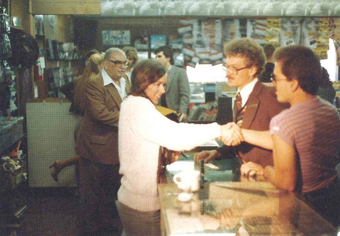 Nicolette Larson greeting fans during an in-store appearance at Capers Corner.