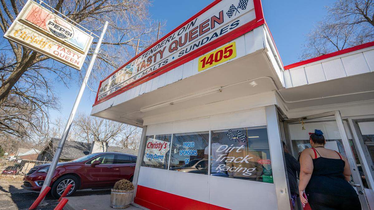 Customers line up outside Christy's Tasty Queen on Wednesday, Feb. 18, 2026, in Kansas City, Kansas. Customers gather for the restaurant's final day under its founding owners.