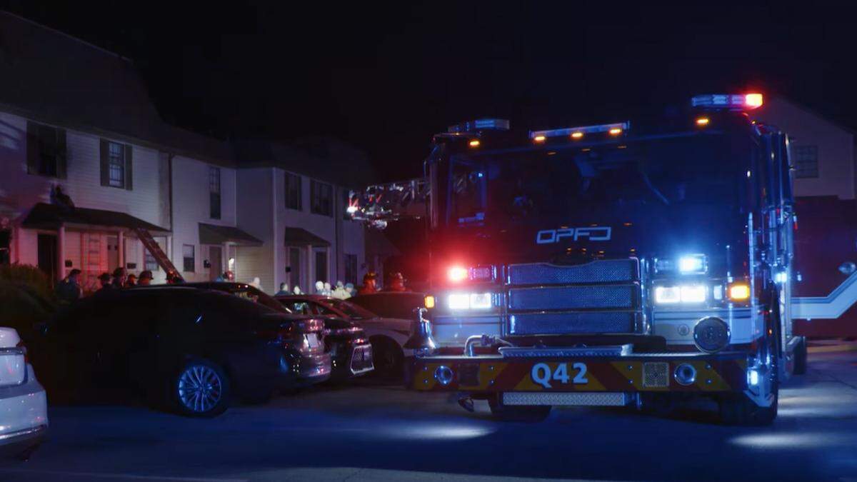 Crews rescued two people from the roof and two others from a second-story bathroom during the blaze at Sheridan Ridge apartments in Overland Park