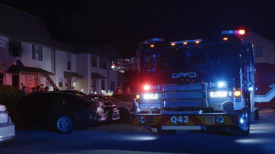 Crews rescued two people from the roof and two others from a second-story bathroom during the blaze at Sheridan Ridge apartments in Overland Park.